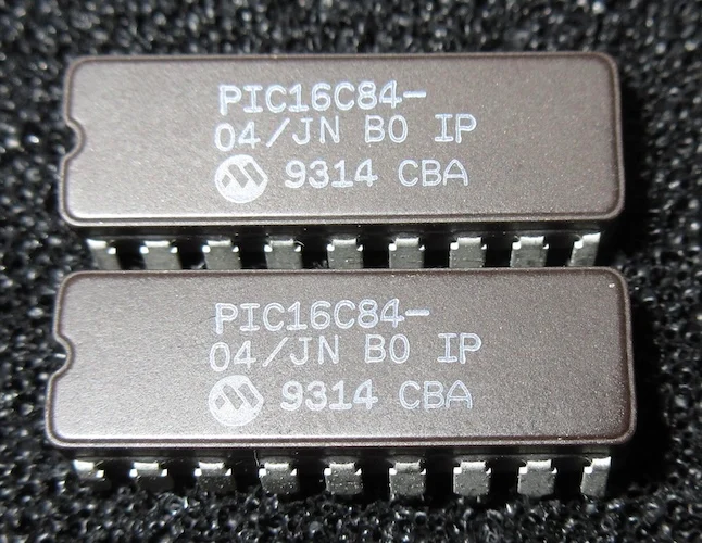 Two Microchip PIC16C84 chips